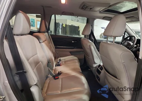 2016 Honda Pilot Touring z USA, uszkodzony, nr VIN 5FNYF6H99GB021822